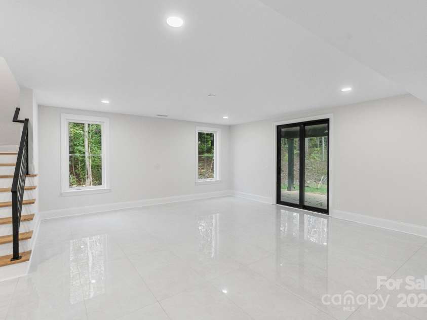 3204 Chancellor Lane, Monroe, NC 28110.  MLS# CAR4292011, YatesRealty ID 3216. Basement Main Rec Room