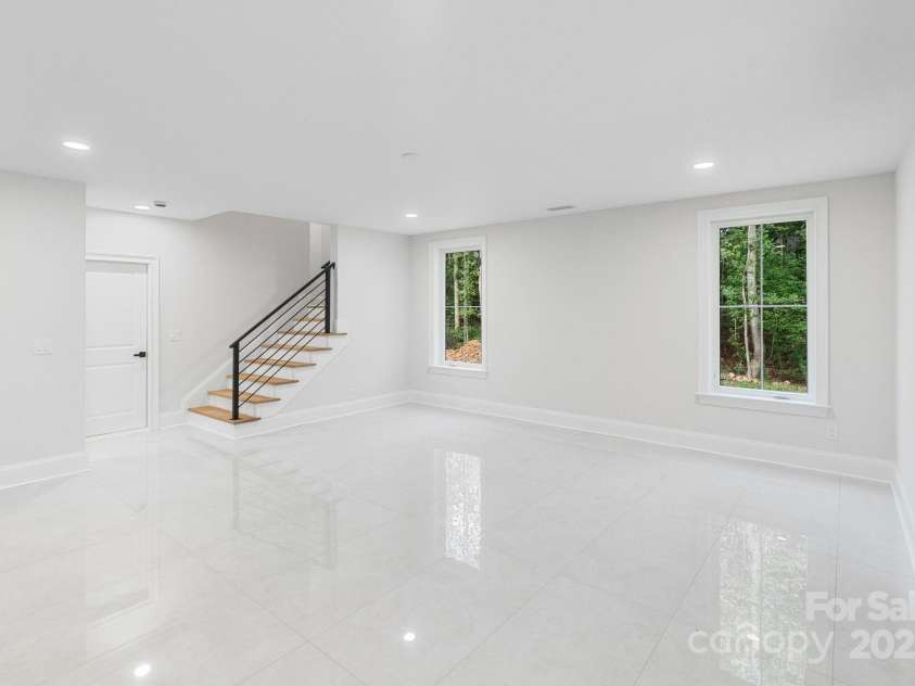 3204 Chancellor Lane, Monroe, NC 28110.  MLS# CAR4292011, YatesRealty ID 3216. Basement Main Rec Room