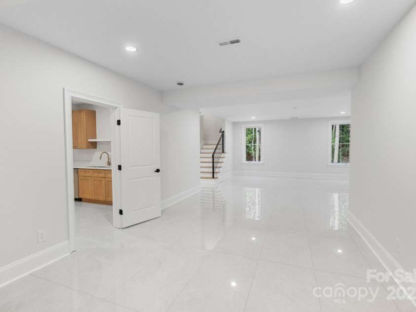 3204 Chancellor Lane, Monroe, NC 28110.  MLS# CAR4292011, YatesRealty ID 3216. Basement Main Rec Room