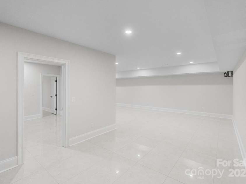 3204 Chancellor Lane, Monroe, NC 28110.  MLS# CAR4292011, YatesRealty ID 3216. Basement Media Room