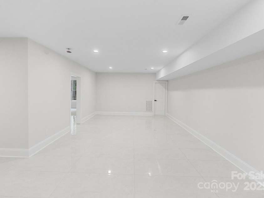 3204 Chancellor Lane, Monroe, NC 28110.  MLS# CAR4292011, YatesRealty ID 3216. Basement Media Room