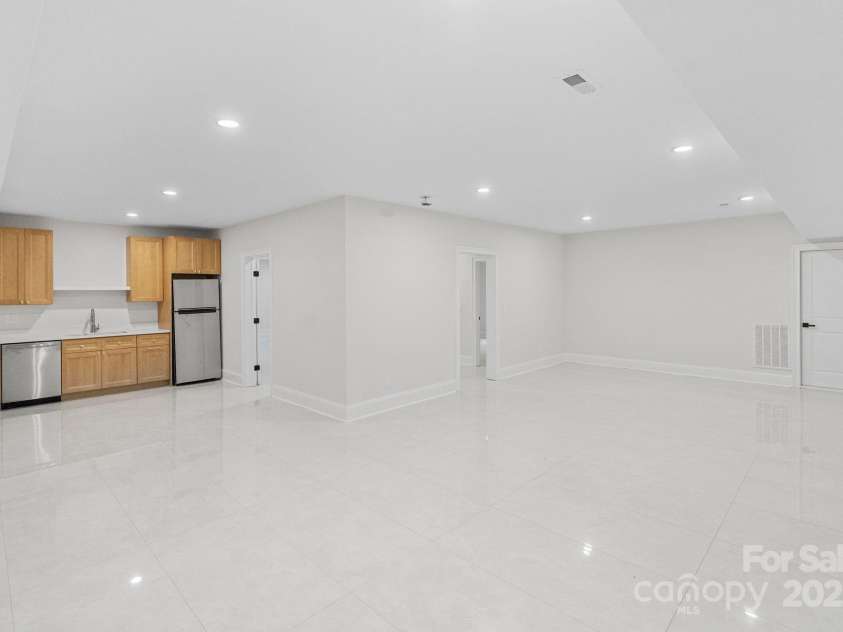 3204 Chancellor Lane, Monroe, NC 28110.  MLS# CAR4292011, YatesRealty ID 3216. Basement Media Room / Wet Bar