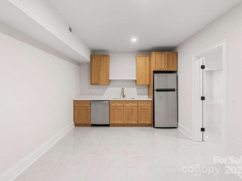 3204 Chancellor Lane, Monroe, NC 28110.  MLS# CAR4292011, YatesRealty ID 3216. Basement Media Room/Wet Bar