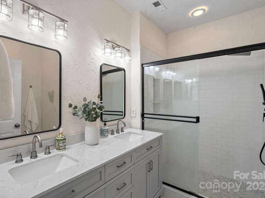 145 Ashford Hollow Lane, Mooresville, NC 28117.  MLS# CAR4289926, YatesRealty ID 32167. Renovated Primary Bath