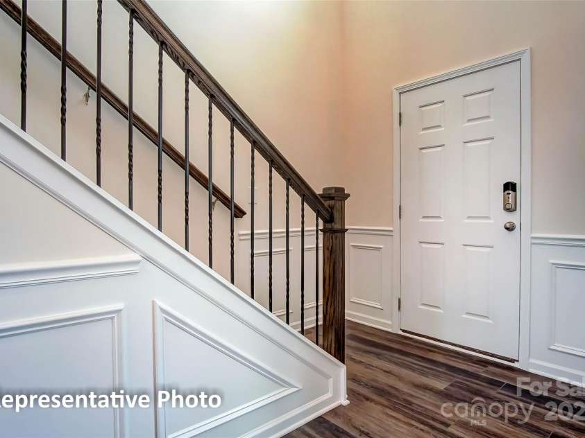 1865 Barksdale Road, Sherrills Ford, NC 28673.  MLS# CAR4290875, YatesRealty ID 32172. This home features metal stair balusters.