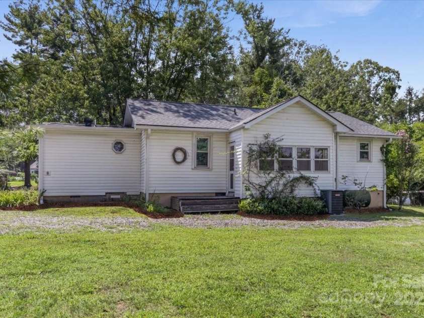 11 Fishers Mill Road, Arden, NC 28704.  MLS# CAR4289304, YatesRealty ID 32176. Back of the house with beautiful yard