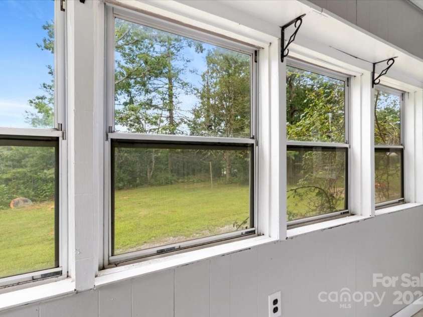 11 Fishers Mill Road, Arden, NC 28704.  MLS# CAR4289304, YatesRealty ID 32176. Looking out of laundry room