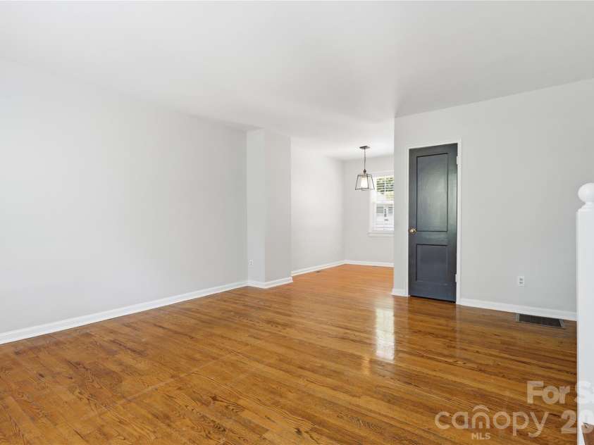 525 Wakefield Drive, Charlotte, NC 28209.  MLS# CAR4391930, YatesRealty ID 32176. View from great room into dining rom