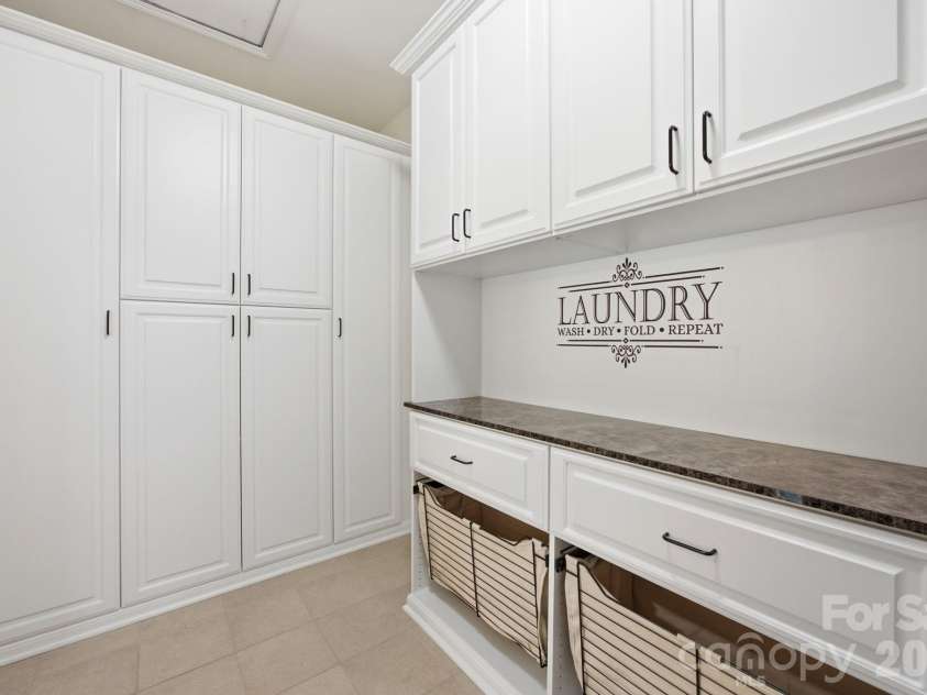 2436 Bergamot Street, Tega Cay, SC 29708.  MLS# CAR4394292, YatesRealty ID 32178. Laundry Room