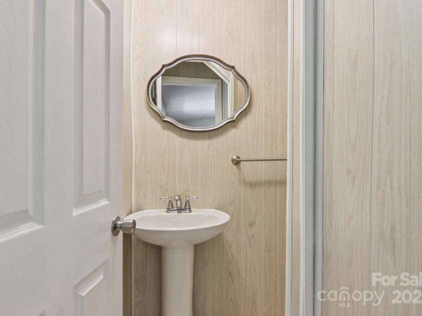 264 Cashdon Drive, Mills River, NC 28759.  MLS# CAR4292467, YatesRealty ID 32179. HALFBATH OFF LIVING ROOM