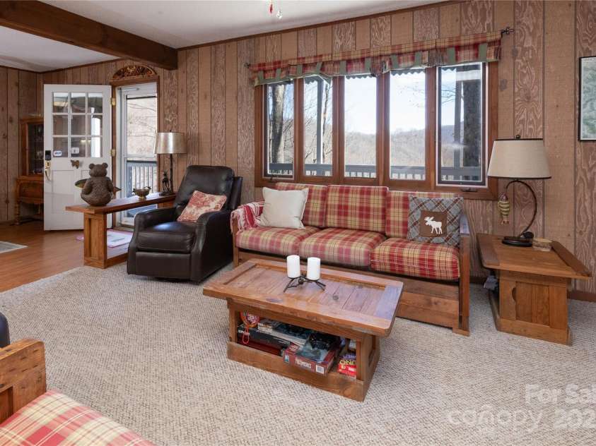 88 Siler Lane, Mars Hill, NC 28754.  MLS# CAR4186167, YatesRealty ID 3218. Living room and entrance to home on the second level.