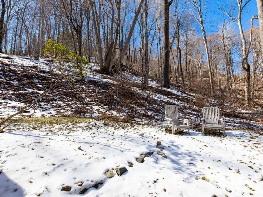 88 Siler Lane, Mars Hill, NC 28754.  MLS# CAR4186167, YatesRealty ID 3218. Sitting area in the back yard.
