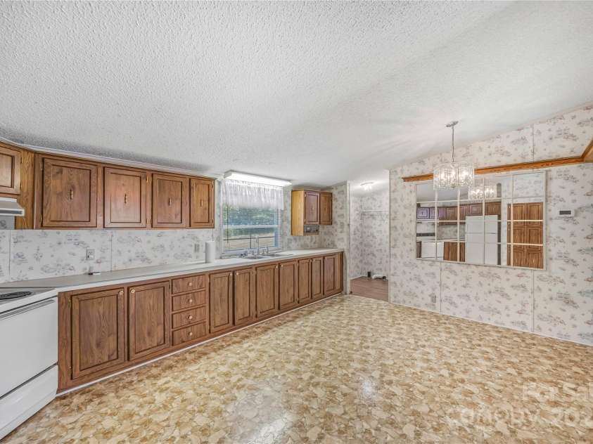 953 Bollinger Pond Drive, Clover, SC 29710.  MLS# CAR4285498, YatesRealty ID 3218. Large kitchen with room for table 