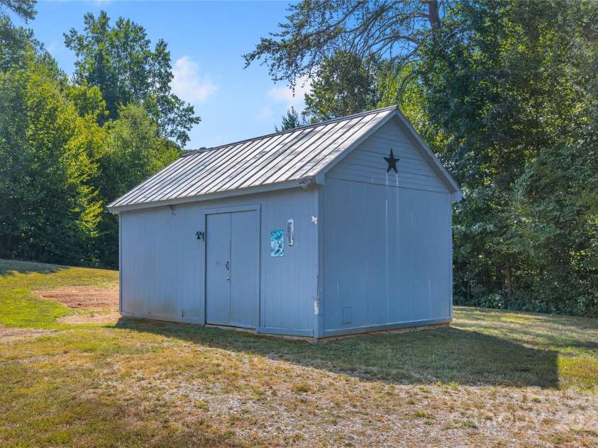 953 Bollinger Pond Drive, Clover, SC 29710.  MLS# CAR4285498, YatesRealty ID 3218. Outbuilding /Workshop / Houses the well 