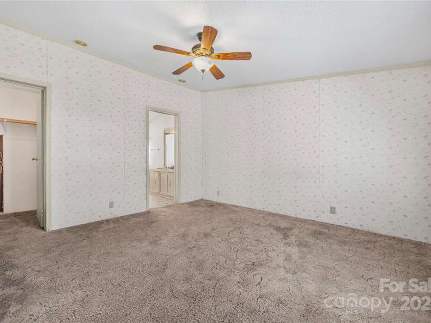 953 Bollinger Pond Drive, Clover, SC 29710.  MLS# CAR4285498, YatesRealty ID 3218. Primary bedroom 