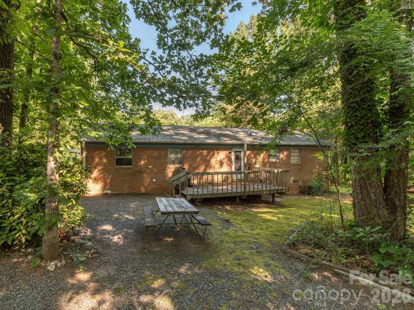 106 Mimosa Lane, Fort Mill, SC 29715.  MLS# CAR4372661, YatesRealty ID 32182. Large Backyard with tree buffers on both sides
