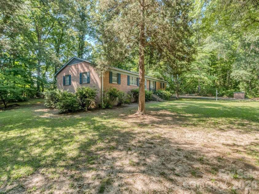 106 Mimosa Lane, Fort Mill, SC 29715.  MLS# CAR4372661, YatesRealty ID 32182. Large yard