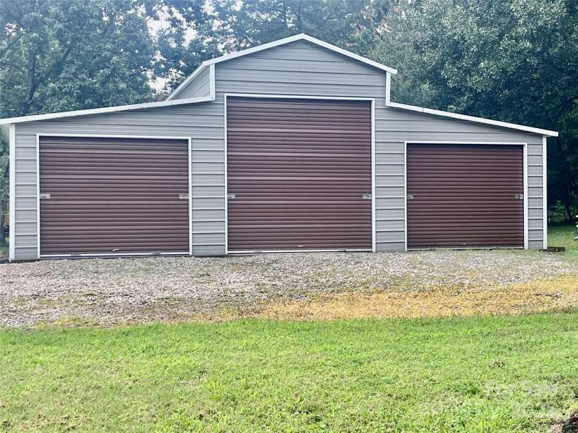 3713 Solen Drive, Harrisburg, NC 28075.  MLS# CAR4288785, YatesRealty ID 32184. 3 Car Garage - Workshop