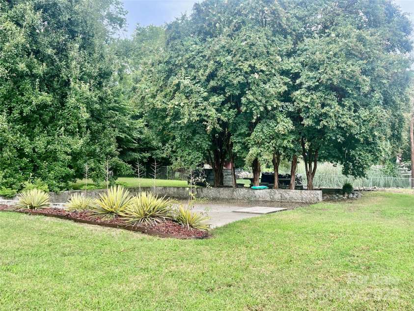 3713 Solen Drive, Harrisburg, NC 28075.  MLS# CAR4288785, YatesRealty ID 32184. Backyard