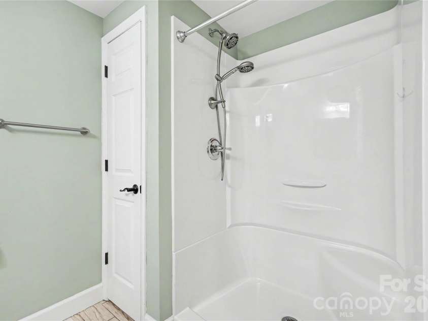 3035 River Road, Shelby, NC 28152.  MLS# CAR4393032, YatesRealty ID 32187. Shower in lower level bathroom