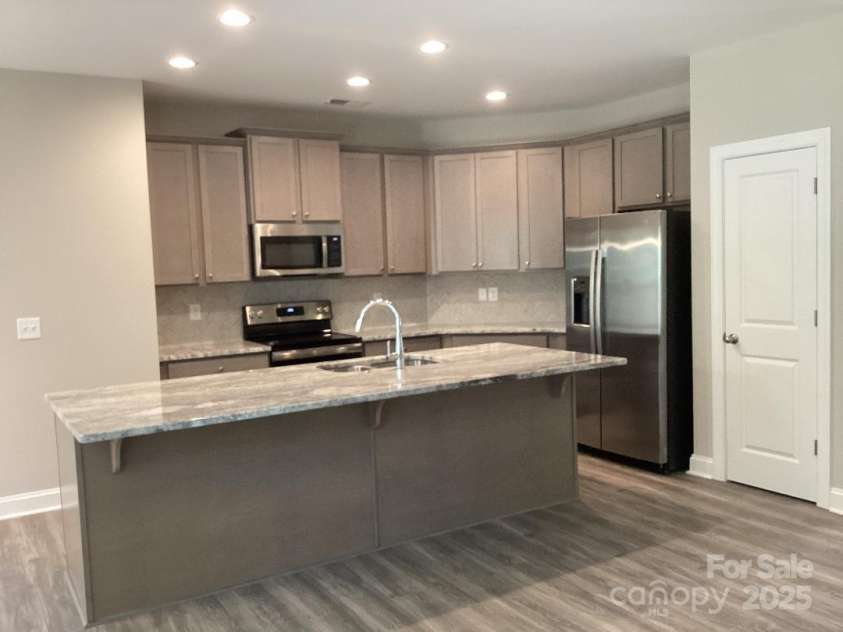 5126 Rocky River Crossing Road, Harrisburg, NC 28075.  MLS# CAR4277877, YatesRealty ID 32189. Gourmet Kitchen