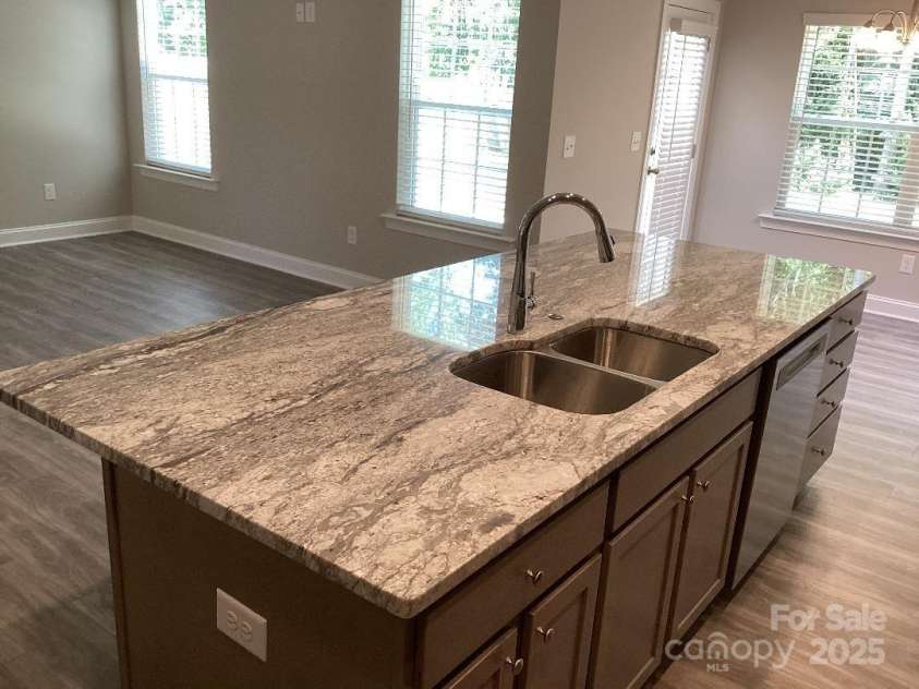 5126 Rocky River Crossing Road, Harrisburg, NC 28075.  MLS# CAR4277877, YatesRealty ID 32189. Huge Kitchen Island
