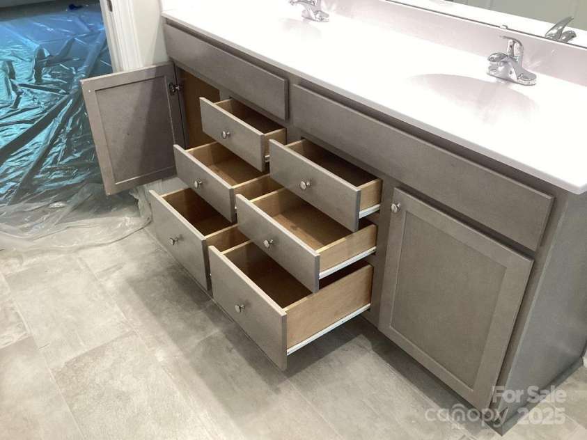 5126 Rocky River Crossing Road, Harrisburg, NC 28075.  MLS# CAR4277877, YatesRealty ID 32189. MBA Dual Sink Vanity