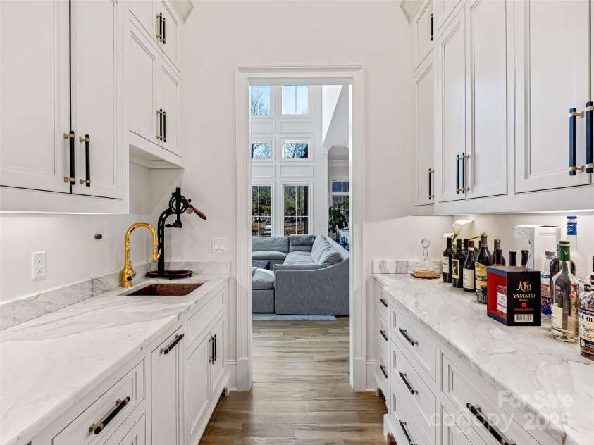 1905 White Tree Trail, Arden, NC 28704.  MLS# CAR4230669, YatesRealty ID 3219. Butlers Pantry connecting Dining Room to Kitchen & Great Room.