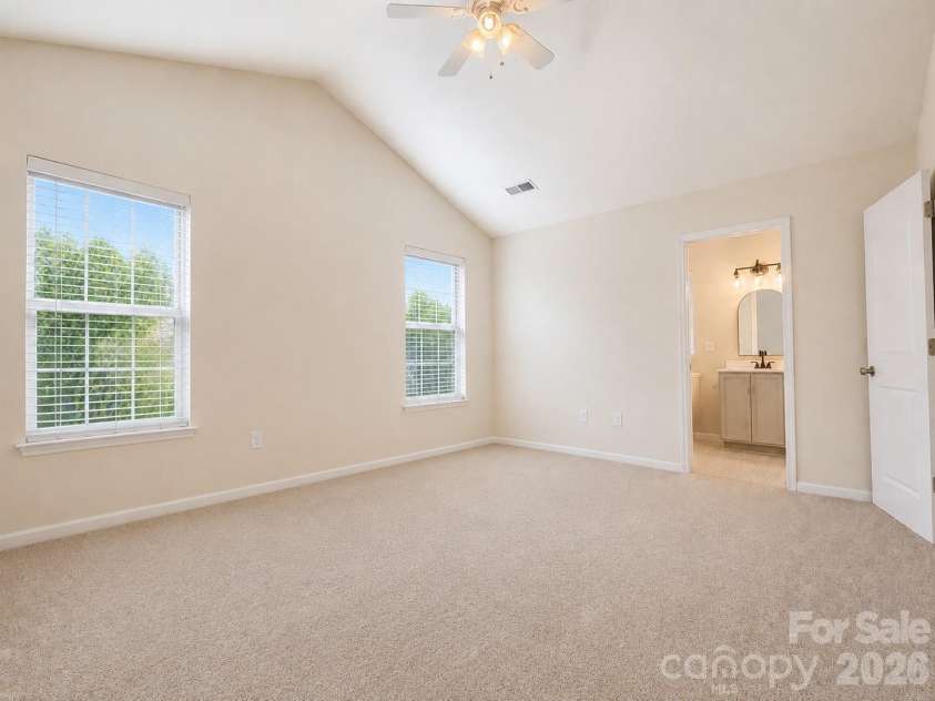 115 High Bluff Circle, Mooresville, NC 28115.  MLS# CAR4389382, YatesRealty ID 32190. Primary Suite with with Walk-in Closet and Updated Bath
