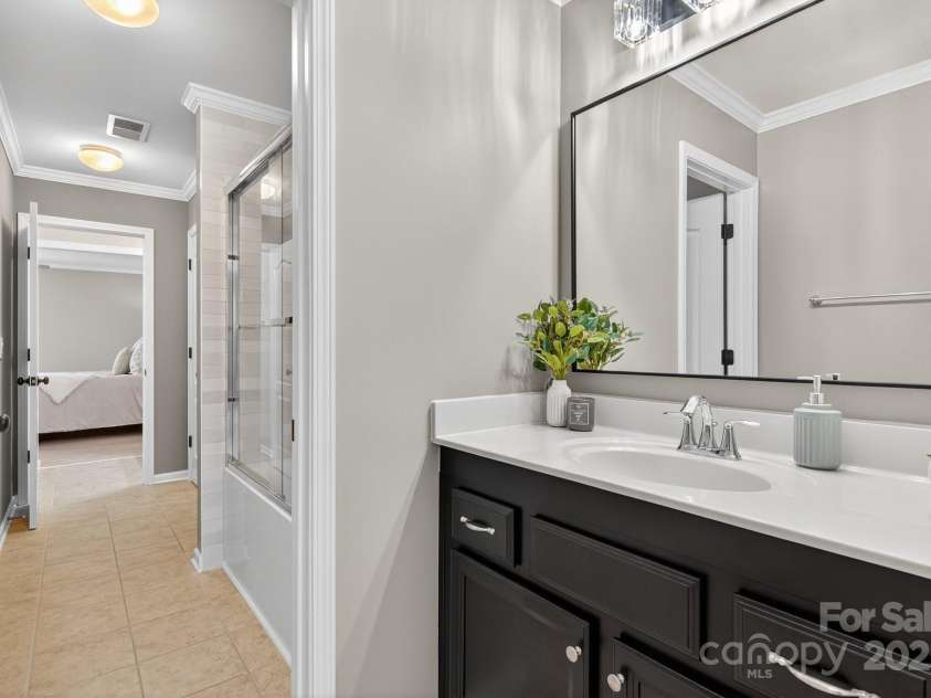 3400 Ringtail Drive, Waxhaw, NC 28173.  MLS# CAR4291096, YatesRealty ID 32194. Raised vanities, new fixtures and lighting