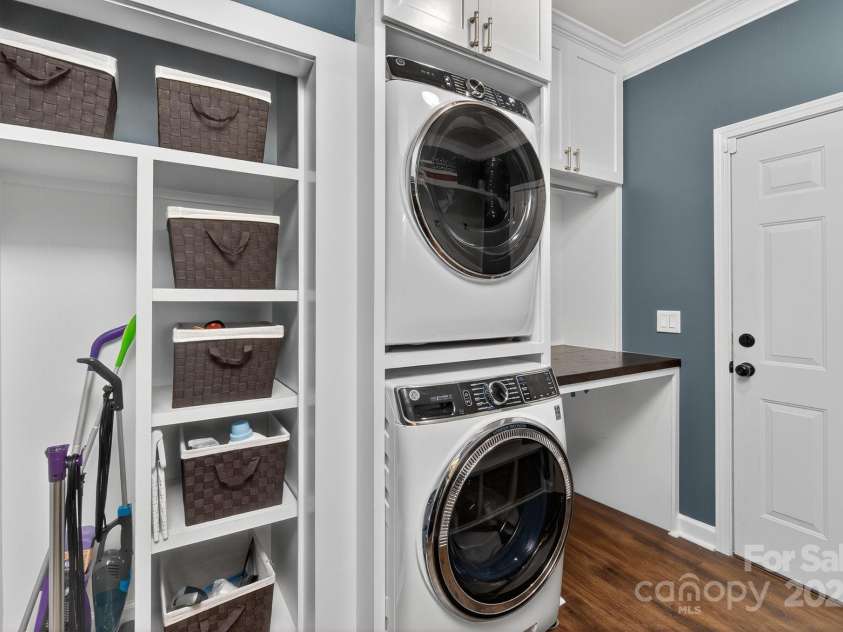 3400 Ringtail Drive, Waxhaw, NC 28173.  MLS# CAR4291096, YatesRealty ID 32194. Remodeled laundry room with cubby system and storage.