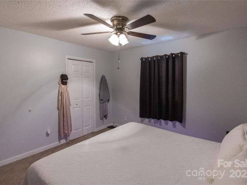 87 Pauline Circle, Franklin, NC 28734.  MLS# CAR4287412, YatesRealty ID 32198. Large Bedroom Level 1
