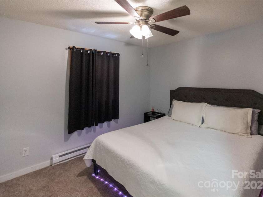 87 Pauline Circle, Franklin, NC 28734.  MLS# CAR4287412, YatesRealty ID 32198. Large Bedroom Level 1