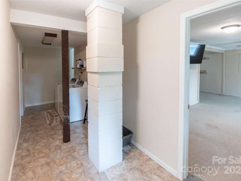 87 Pauline Circle, Franklin, NC 28734.  MLS# CAR4287412, YatesRealty ID 32198. Laundry