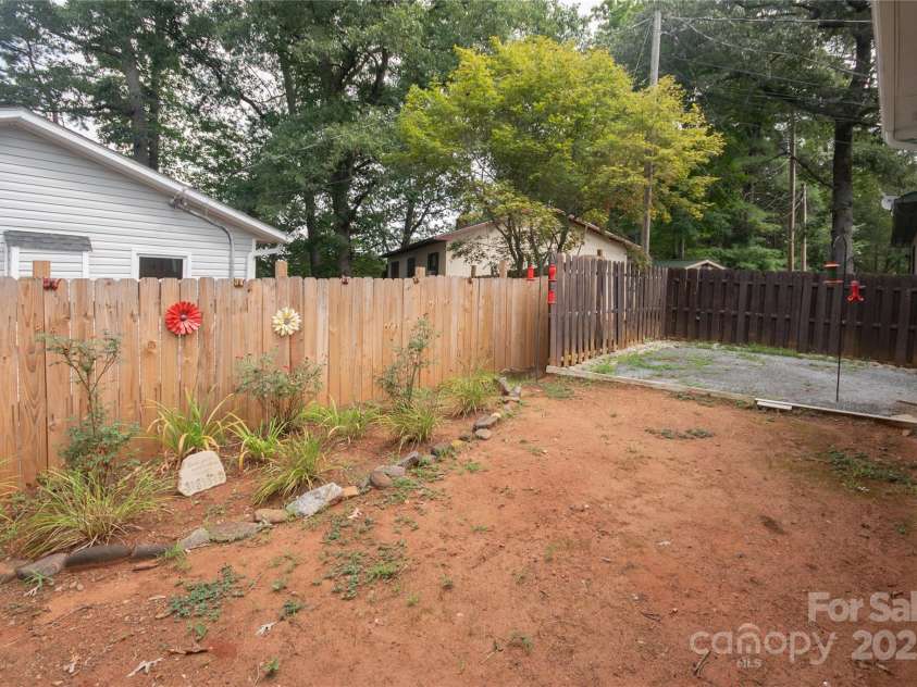 87 Pauline Circle, Franklin, NC 28734.  MLS# CAR4287412, YatesRealty ID 32198. Rear patio area