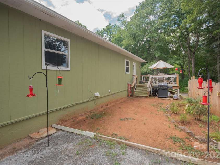 87 Pauline Circle, Franklin, NC 28734.  MLS# CAR4287412, YatesRealty ID 32198. Rear patio area