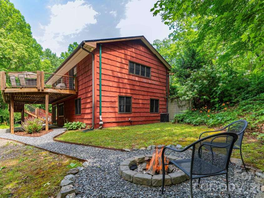 168 Blossom Ridge, Leicester, NC 28748.  MLS# CAR4389201, YatesRealty ID 32199. Back Yard with Firepit