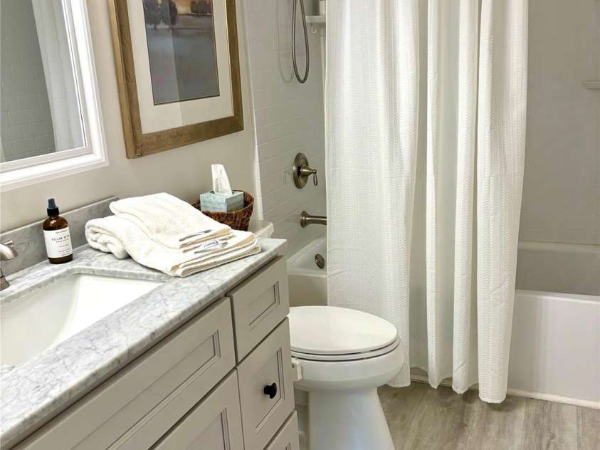 6132 Heath Ridge Court, Charlotte, NC 28210.  MLS# CAR4189441, YatesRealty ID 322. Sleek Updated Bathroom with Subway Tile in Shower