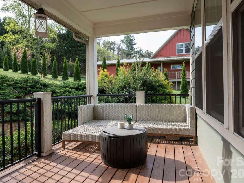 25 Haven Drive, Arden, NC 28704.  MLS# CAR4368689, YatesRealty ID 32201. Covered Back Porch