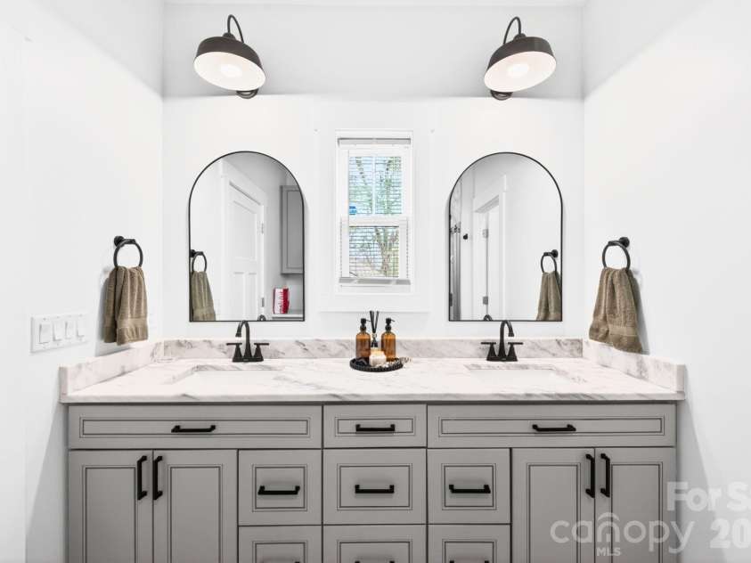 25 Haven Drive, Arden, NC 28704.  MLS# CAR4368689, YatesRealty ID 32201. Dual Primary Bathroom Vanity