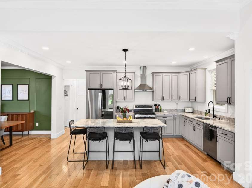 25 Haven Drive, Arden, NC 28704.  MLS# CAR4368689, YatesRealty ID 32201. Kitchen with Bar Seating at the Island