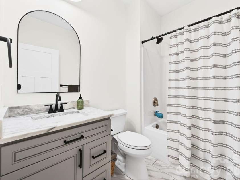 25 Haven Drive, Arden, NC 28704.  MLS# CAR4368689, YatesRealty ID 32201. Shared Downstairs Bathroom