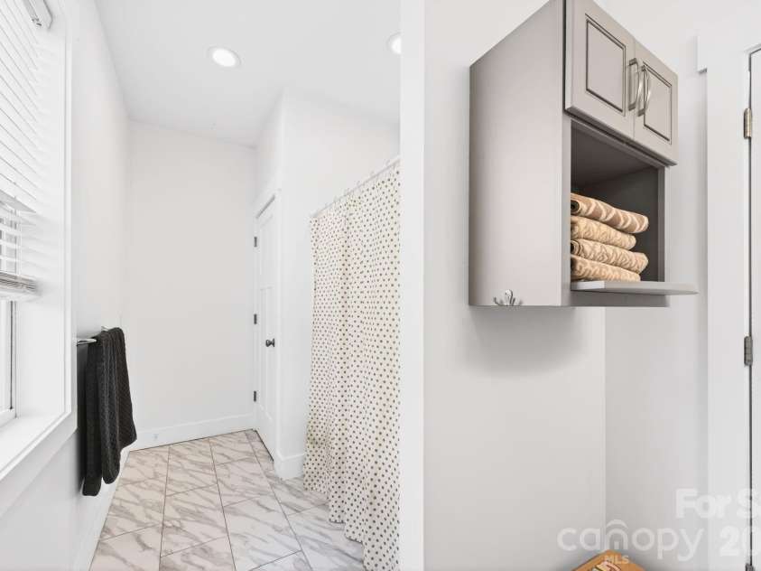 25 Haven Drive, Arden, NC 28704.  MLS# CAR4368689, YatesRealty ID 32201. Upstairs Bathroom Shower