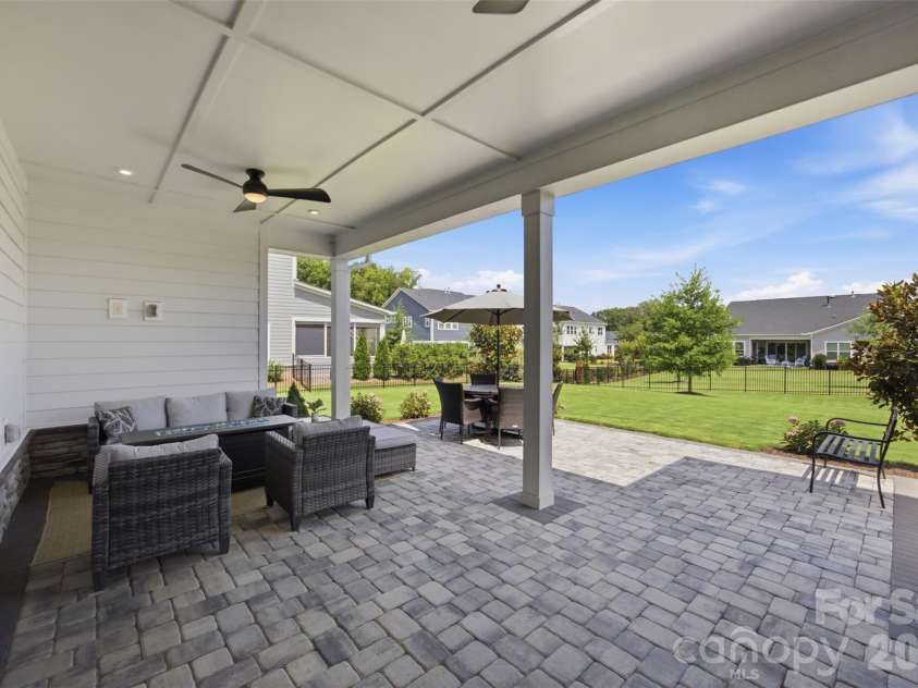 510 Meadow Ridge Drive, Belmont, NC 28012.  MLS# CAR4412652, YatesRealty ID 32204. Extended covered paver patio.