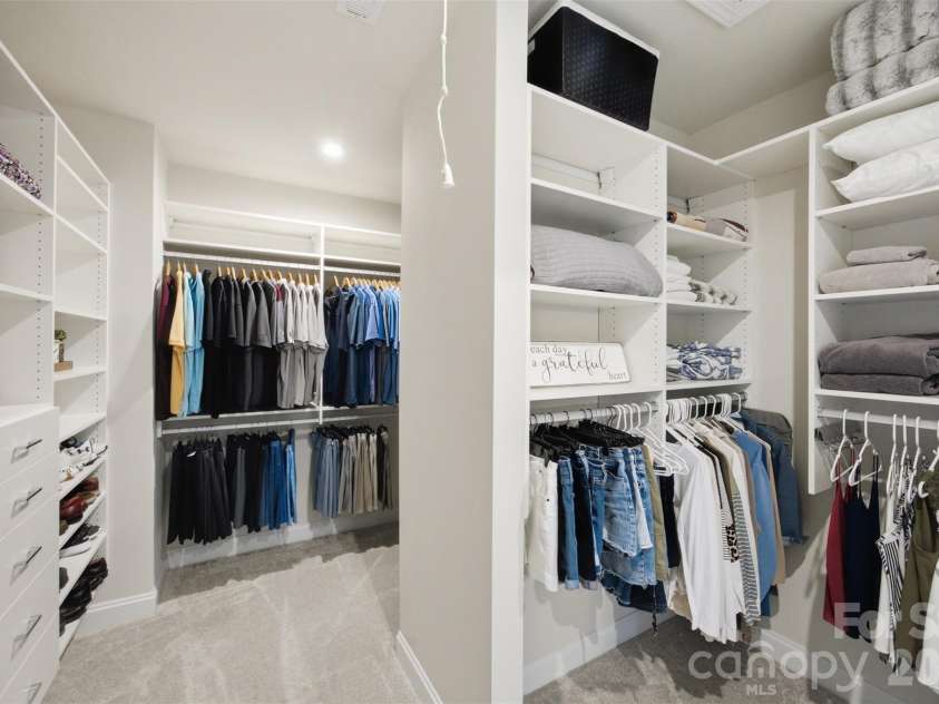510 Meadow Ridge Drive, Belmont, NC 28012.  MLS# CAR4412652, YatesRealty ID 32204. Upper level- primary suite custom walk in closet.