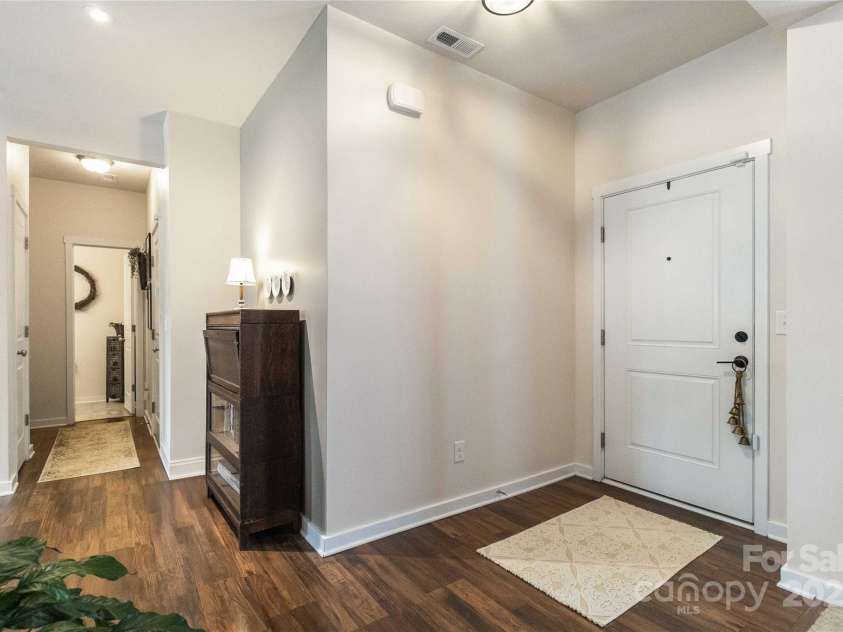 4626 Gibbons Link Road, Charlotte, NC 28269.  MLS# CAR4290378, YatesRealty ID 32205. Bright foyer with direct access to drop zone, garage and bathroom.