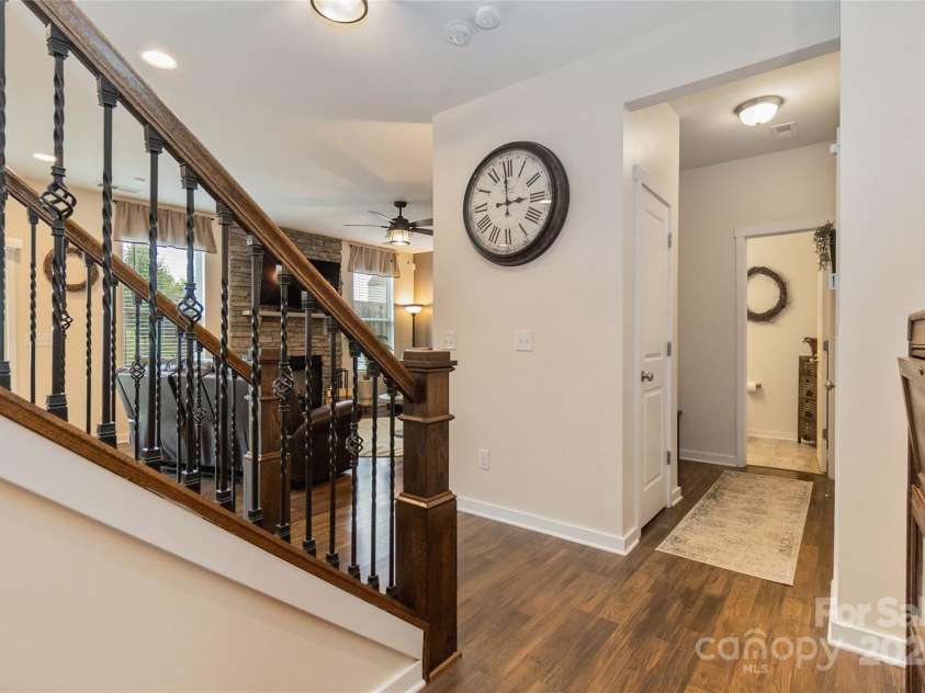 4626 Gibbons Link Road, Charlotte, NC 28269.  MLS# CAR4290378, YatesRealty ID 32205. Classic open spindle staircase.