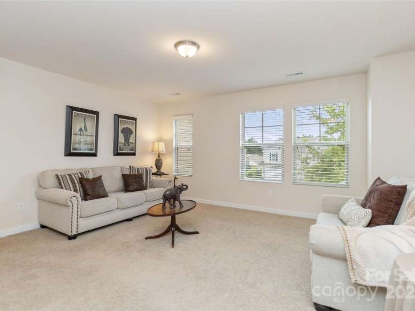 4626 Gibbons Link Road, Charlotte, NC 28269.  MLS# CAR4290378, YatesRealty ID 32205. Spacious second level loft ideal for media, flex, or work-from-home space.