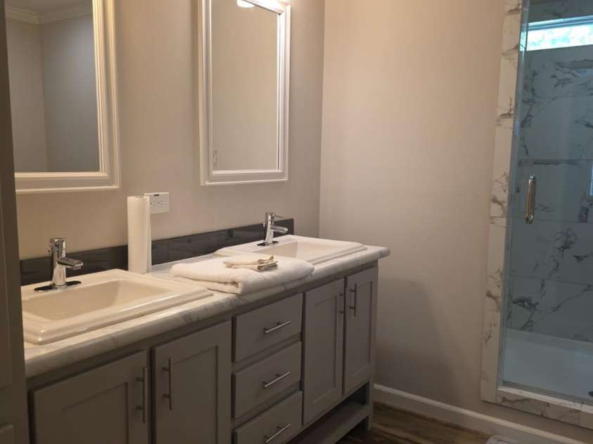 2939 Landfill Road, Mt Croghan, SC 29727.  MLS# CAR4291002, YatesRealty ID 32207. Ensuite bathroom with double vanity and oversized walk in shower.