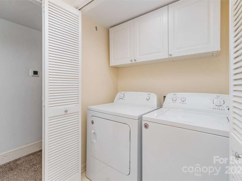 3001 Heathstead Place, Charlotte, NC 28210.  MLS# CAR4287367, YatesRealty ID 3221. WASHER AND DRYER ARE IN HALL BATHROOM CLOSET WITH EXTRA CABINETS 